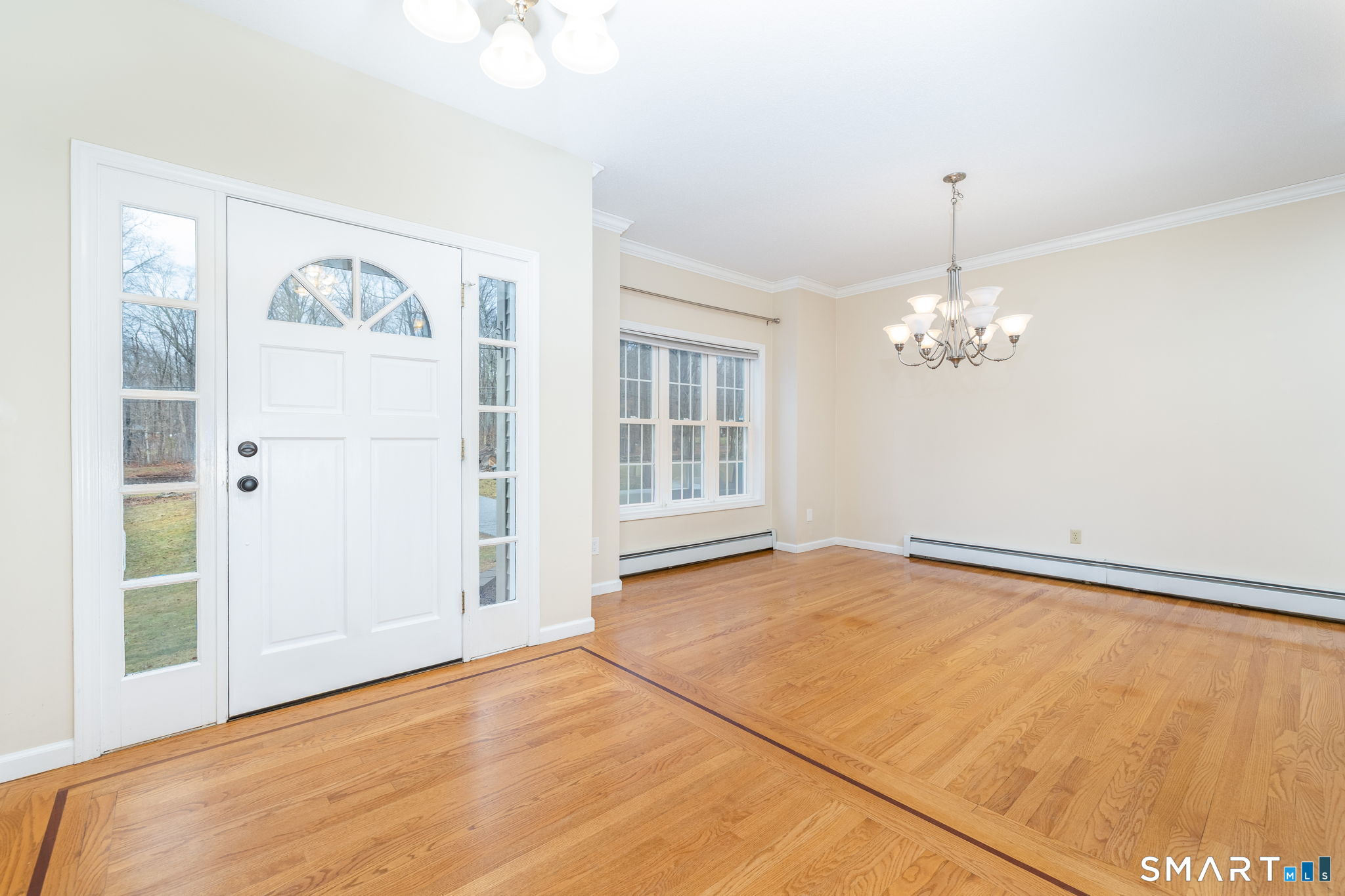 559 West Main Street Hebron, CT 06231 - Photo 6 of 29 a view of an empty room with chandelier fan