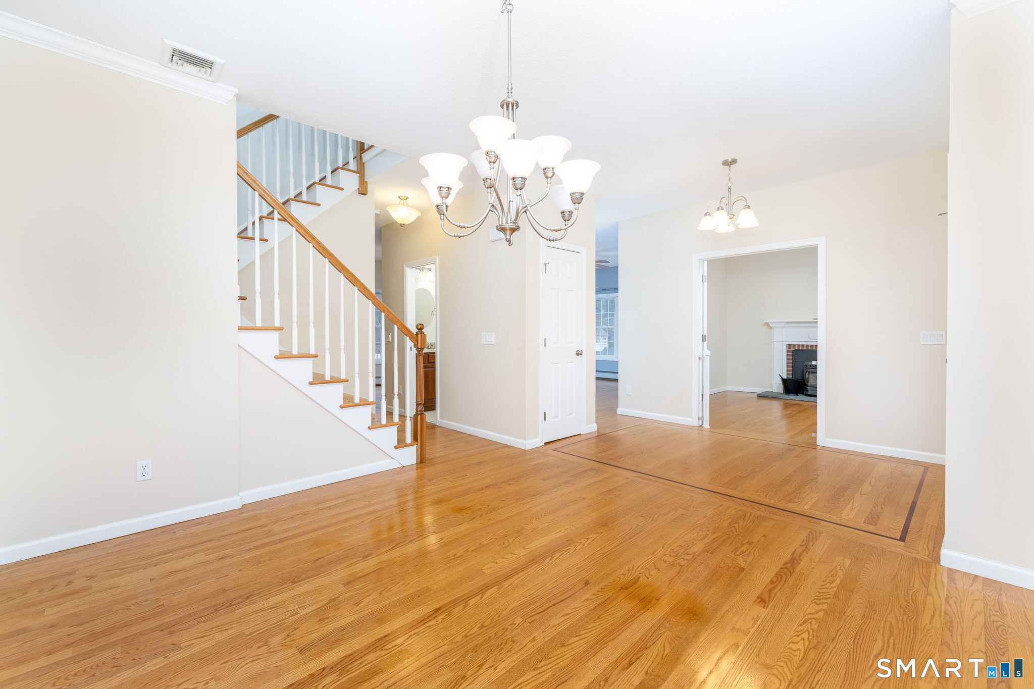 559 West Main Street Hebron, CT 06231 - Photo 7 of 29 a view of an empty room with wooden floor