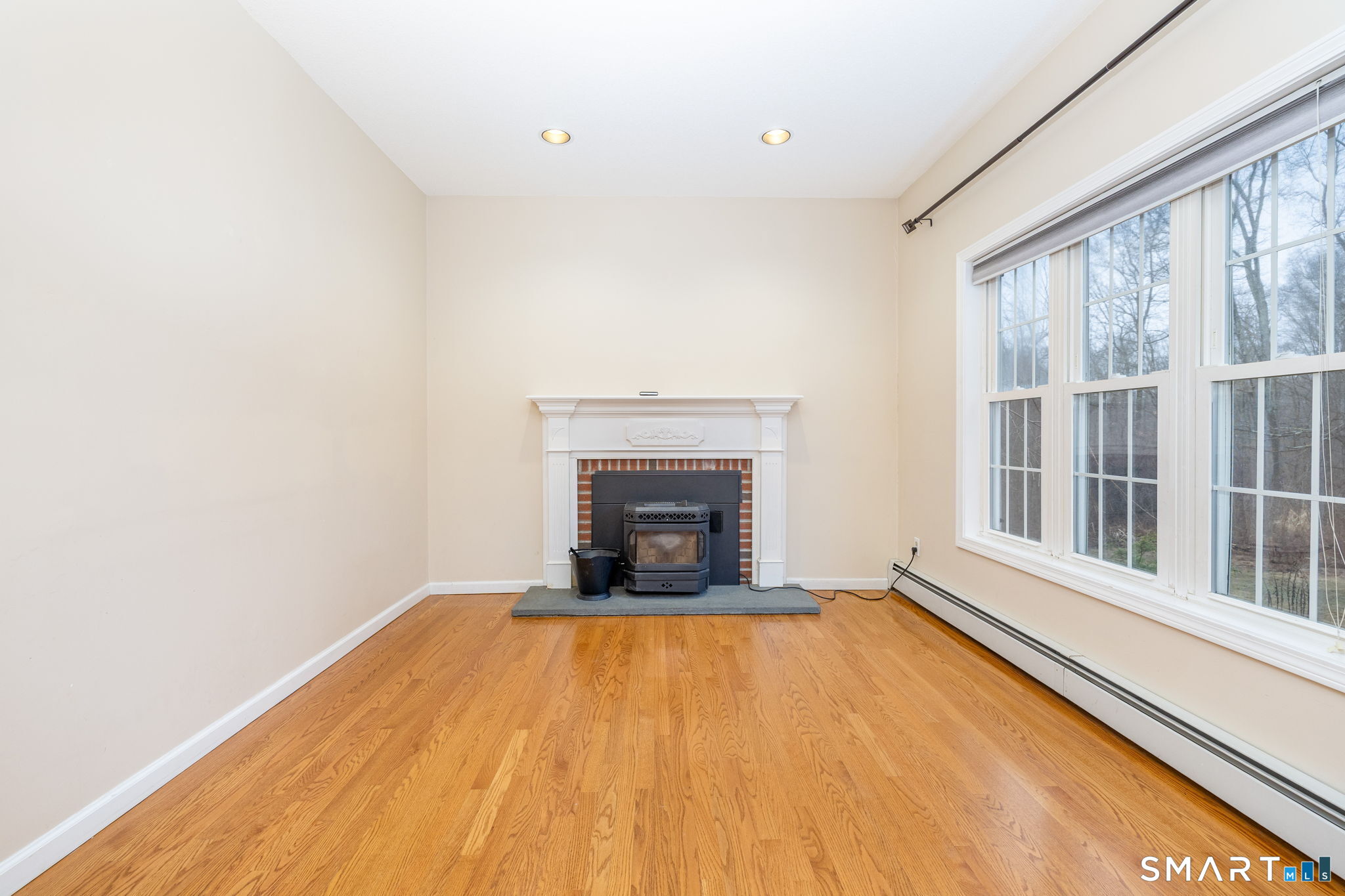 559 West Main Street Hebron, CT 06231 - Photo 10 of 29 a view of an empty room with a window