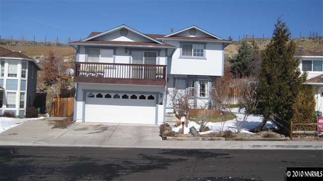 3661 Shale Court Reno, NV 89503 - Photo 1 of 9 a front view of a house with a yard