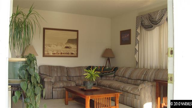 3661 Shale Court Reno, NV 89503 - Photo 2 of 9 a living room with furniture and a wooden floor