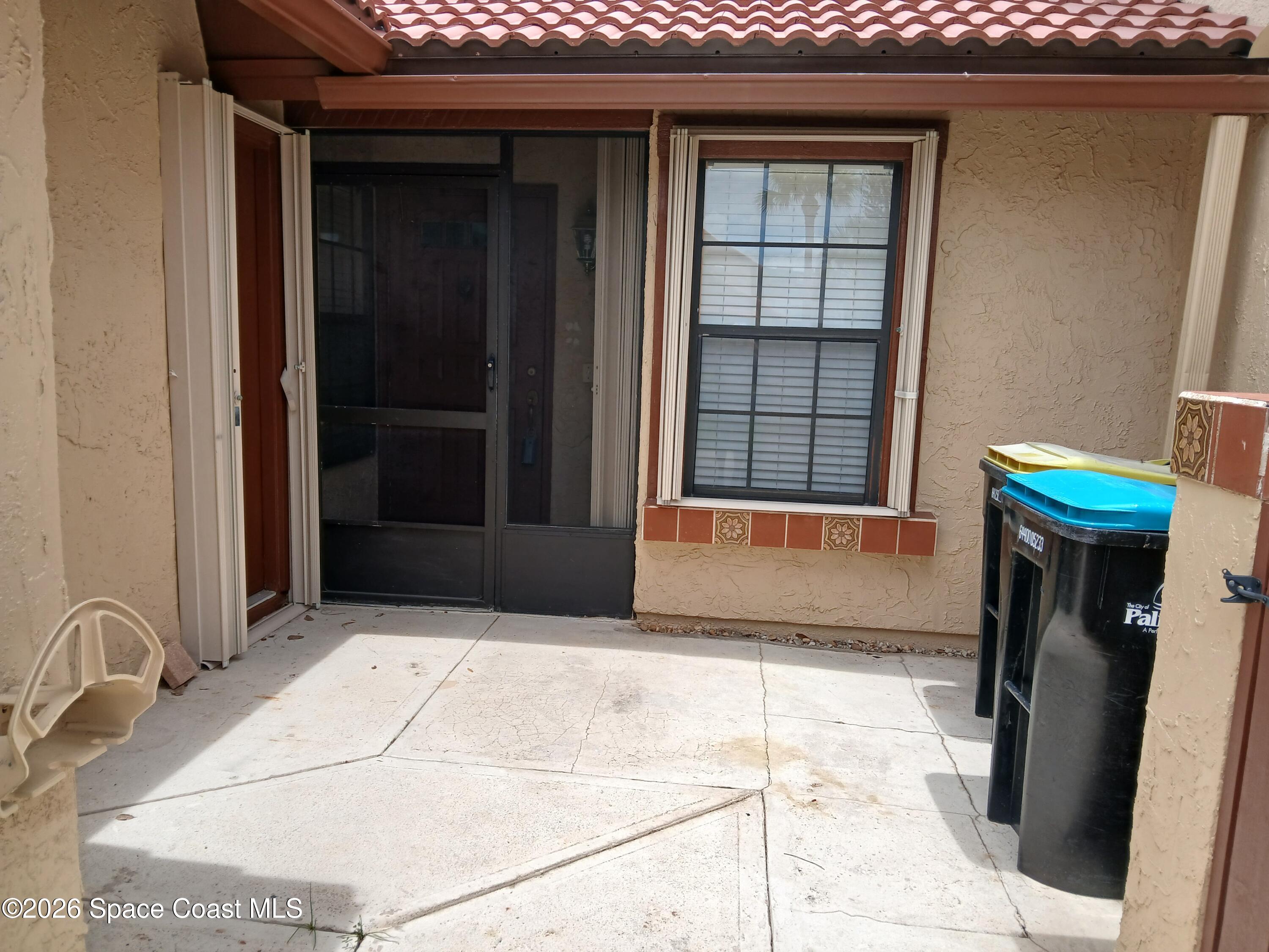 1687 Avery Road Northeast Palm Bay, FL 32905 - Photo 2 of 6 Entry Courtyard