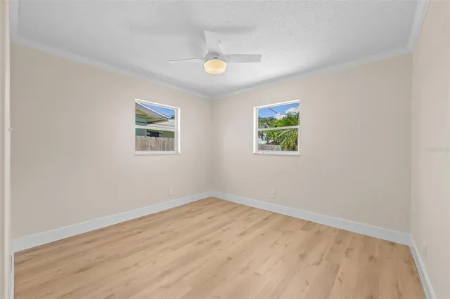 an empty room with windows