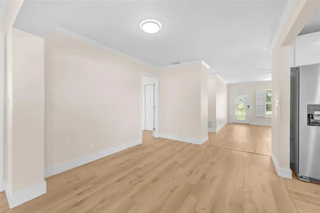 a view of a livingroom with wooden floor