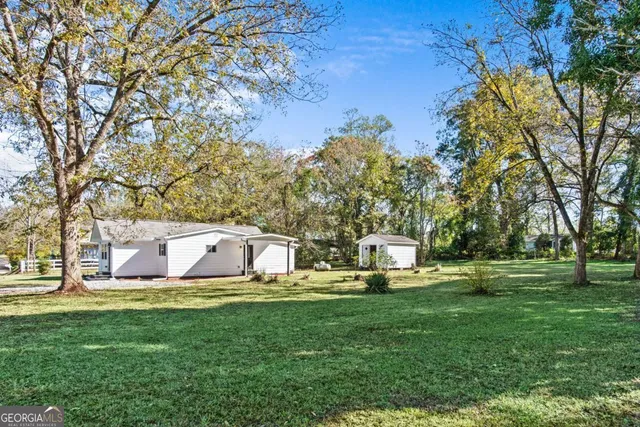 a house view with a outdoor space