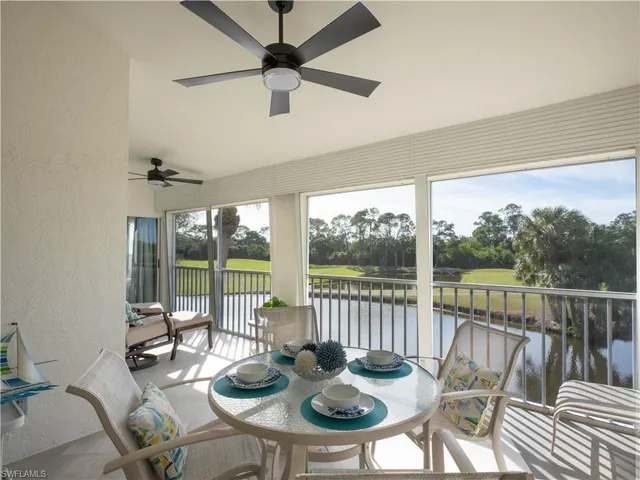 a view of a dining room and furniture window and outside view