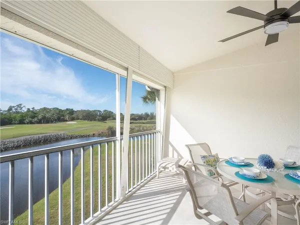 a view of balcony with furniture