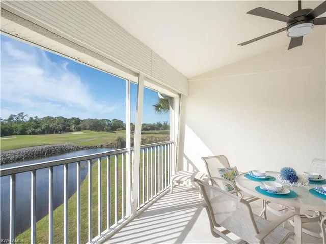 a view of balcony with furniture