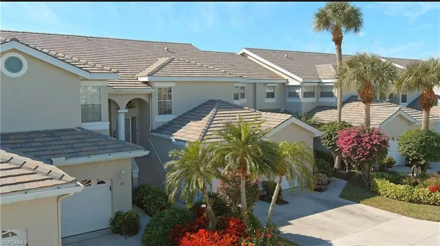 swimming pool view with a seating space