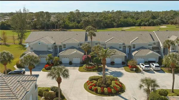 an aerial view of a house having yard