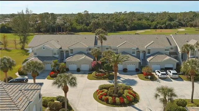 an aerial view of a house having yard