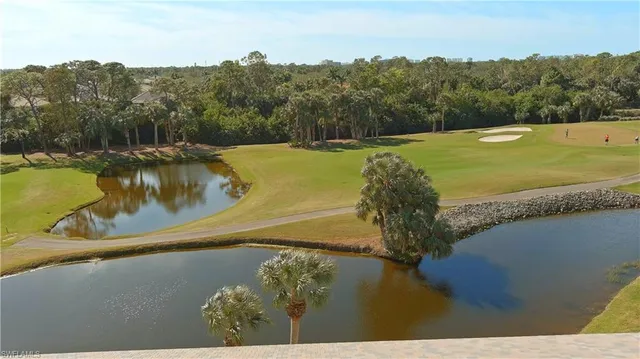 a view of a lake with a yard