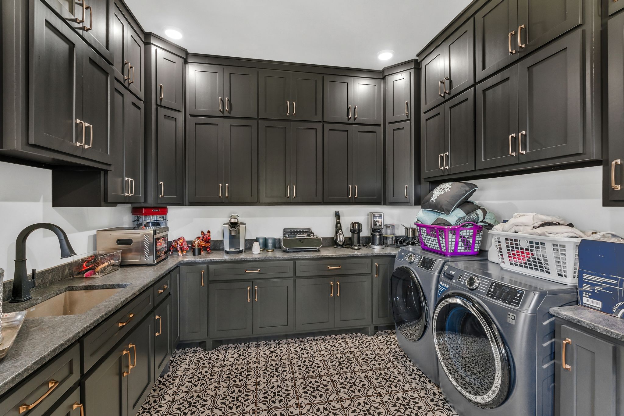 128 Emma Street Hohenwald, TN 38462 - Photo 19 of 96 a kitchen with granite countertop a sink stainless steel appliances and cabinets