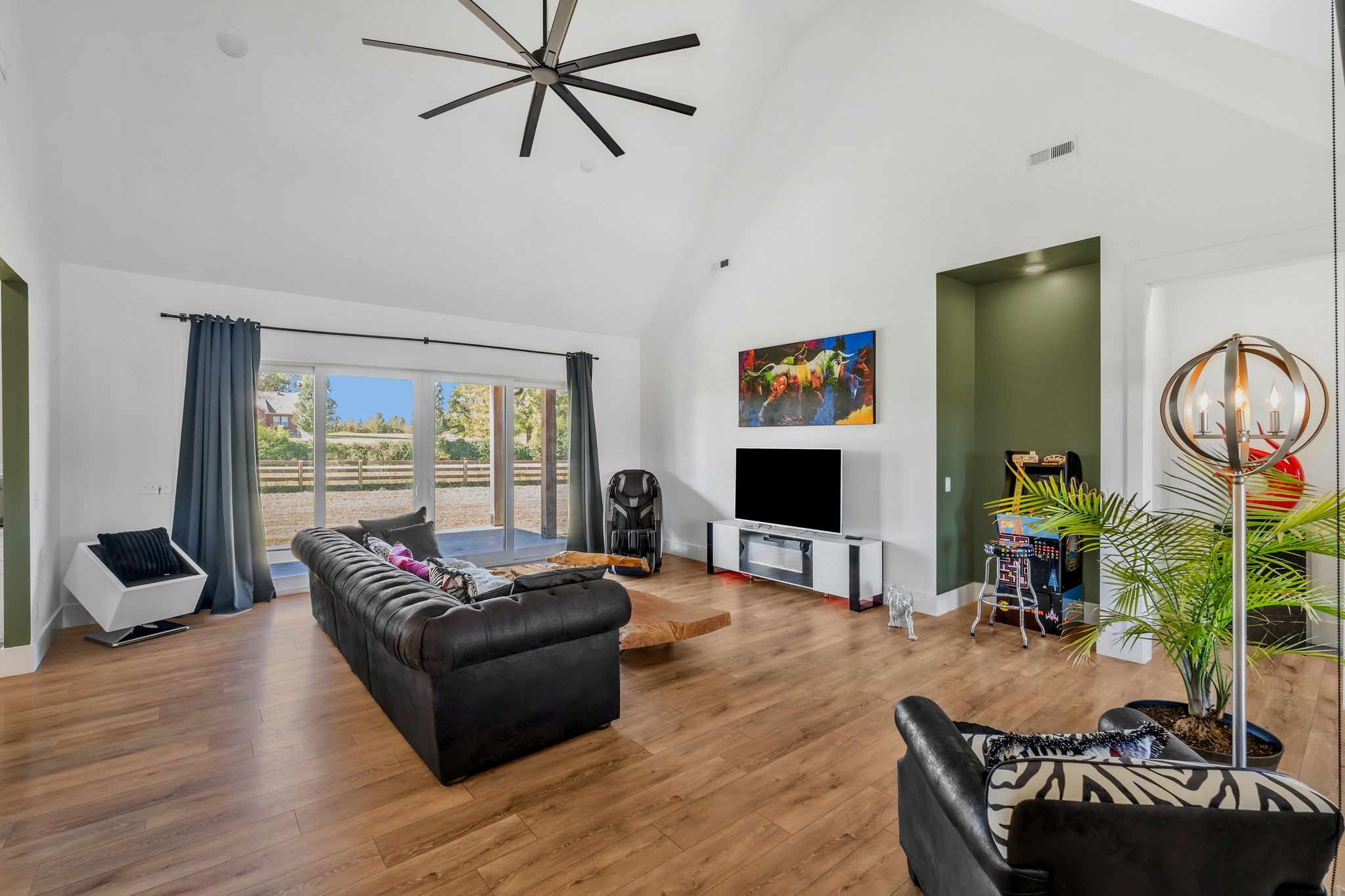 128 Emma Street Hohenwald, TN 38462 - Photo 21 of 96 a living room with furniture and a flat screen tv