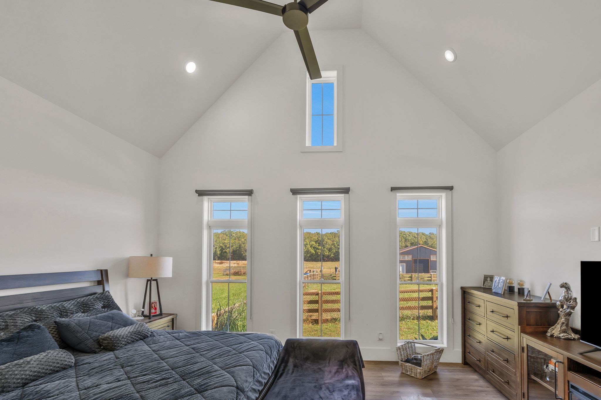 128 Emma Street Hohenwald, TN 38462 - Photo 29 of 96 a bedroom with a bed and a window