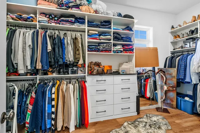 a view of a field with an ocean view