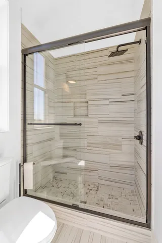 an aerial view of a house with outdoor space