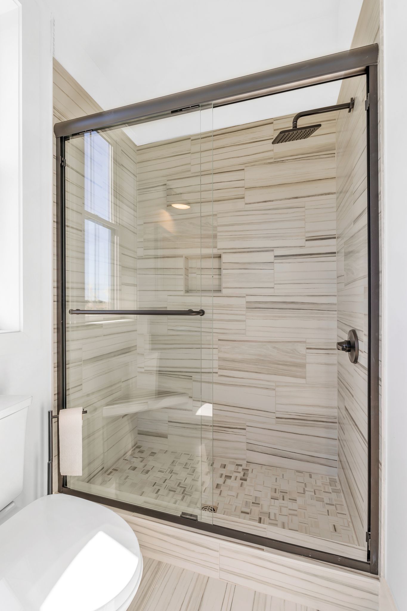 128 Emma Street Hohenwald, TN 38462 - Photo 38 of 96 a bathroom with a shower and toilet