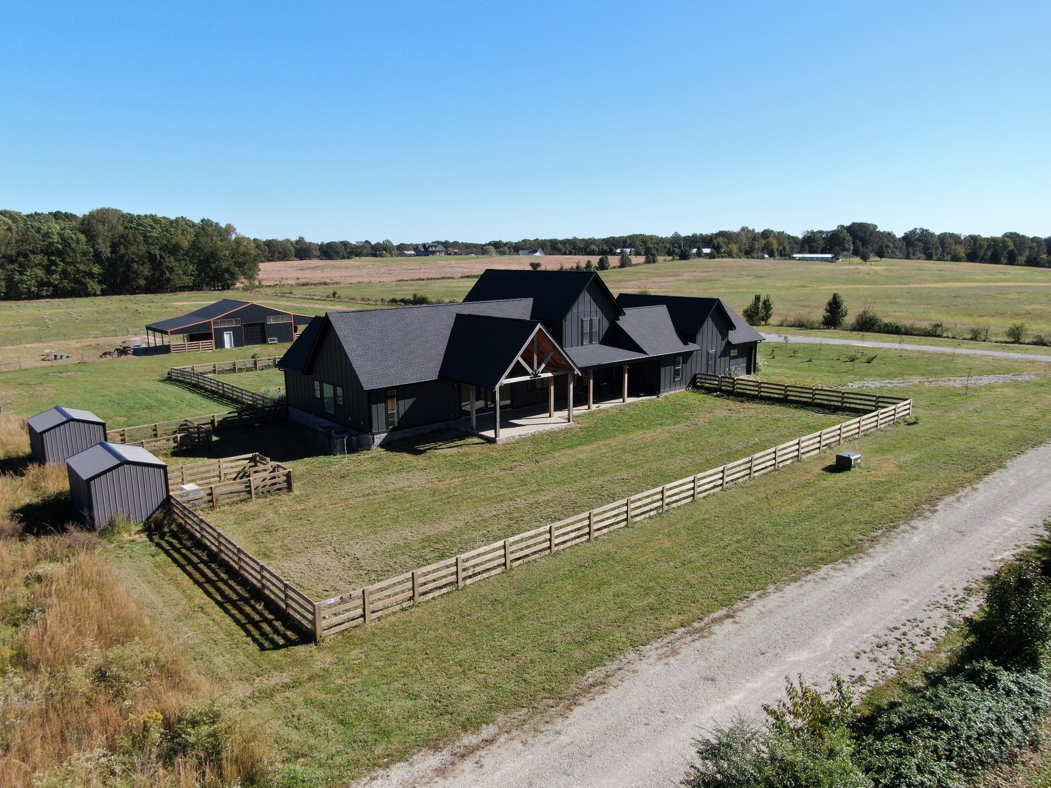 128 Emma Street Hohenwald, TN 38462 - Photo 68 of 96 an aerial view of a house with a yard