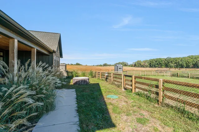 a kitchen with stainless steel appliances a sink a stove and a refrigerator