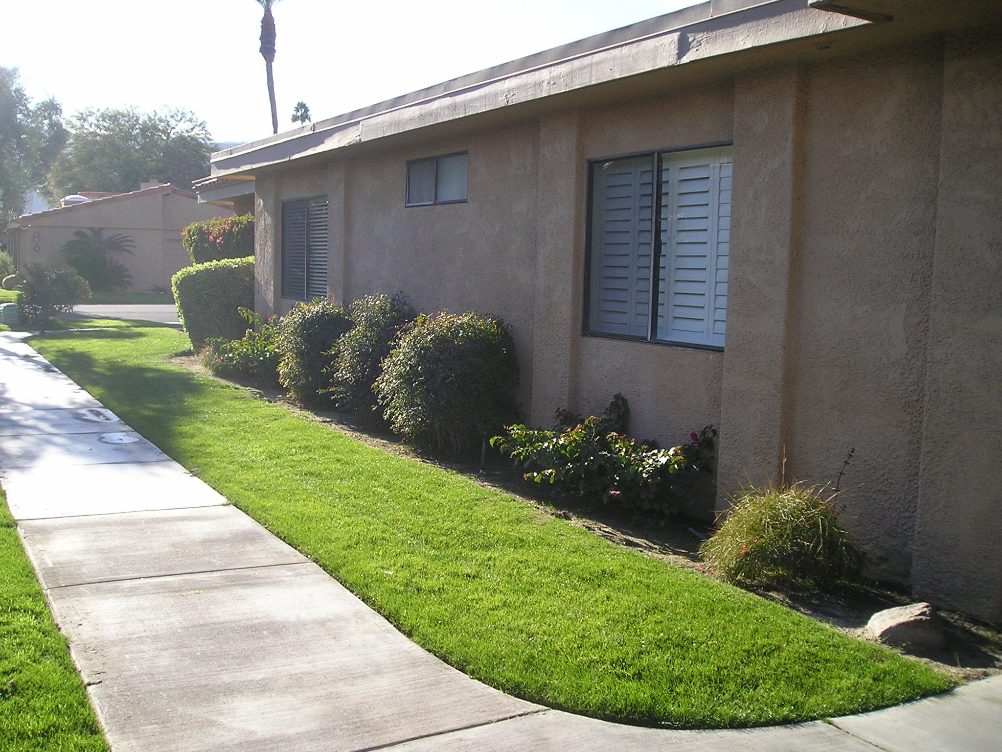 38 Malaga Drive Rancho Mirage, CA 92270 - Photo 2 of 37 a view of a house with a backyard