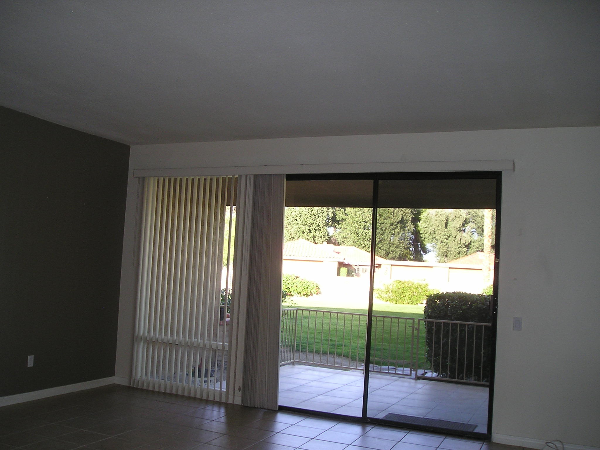 38 Malaga Drive Rancho Mirage, CA 92270 - Photo 14 of 37 a view of empty room with wooden floor and fan