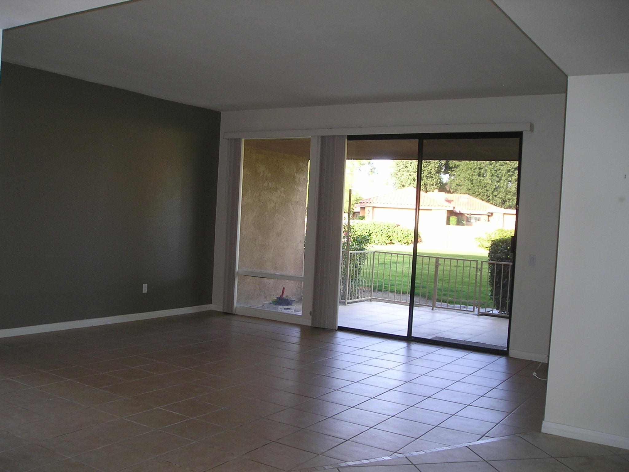 38 Malaga Drive Rancho Mirage, CA 92270 - Photo 17 of 37 a view of an empty room with wooden floor and door