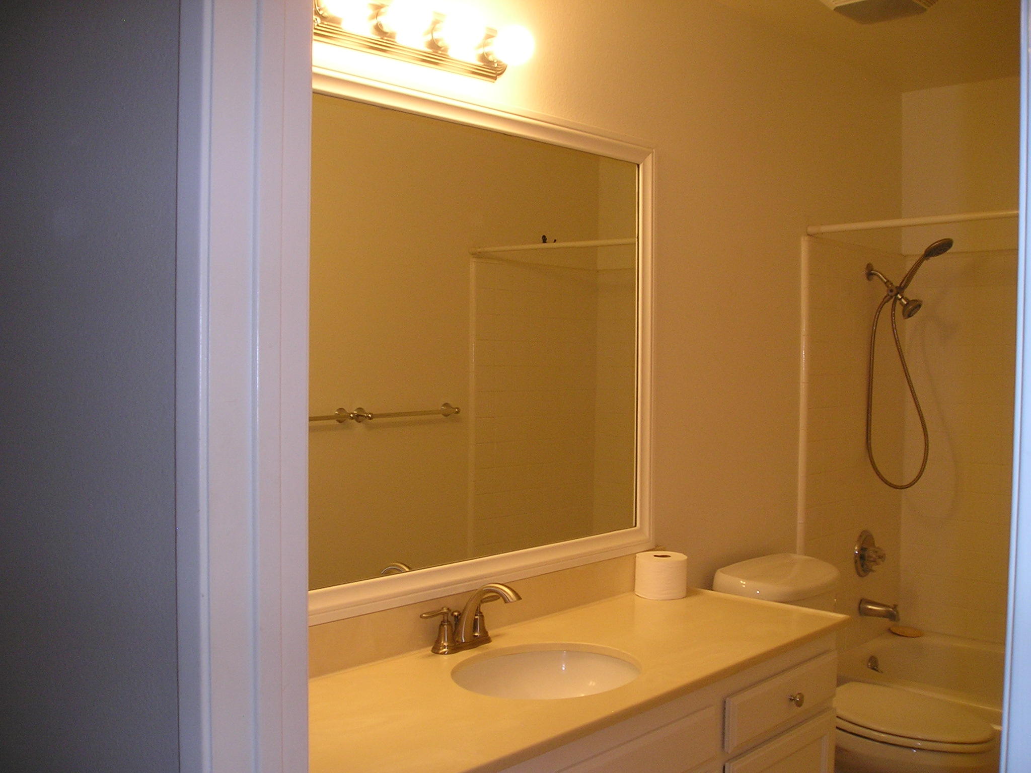 38 Malaga Drive Rancho Mirage, CA 92270 - Photo 18 of 37 a bathroom with a granite countertop sink and a mirror