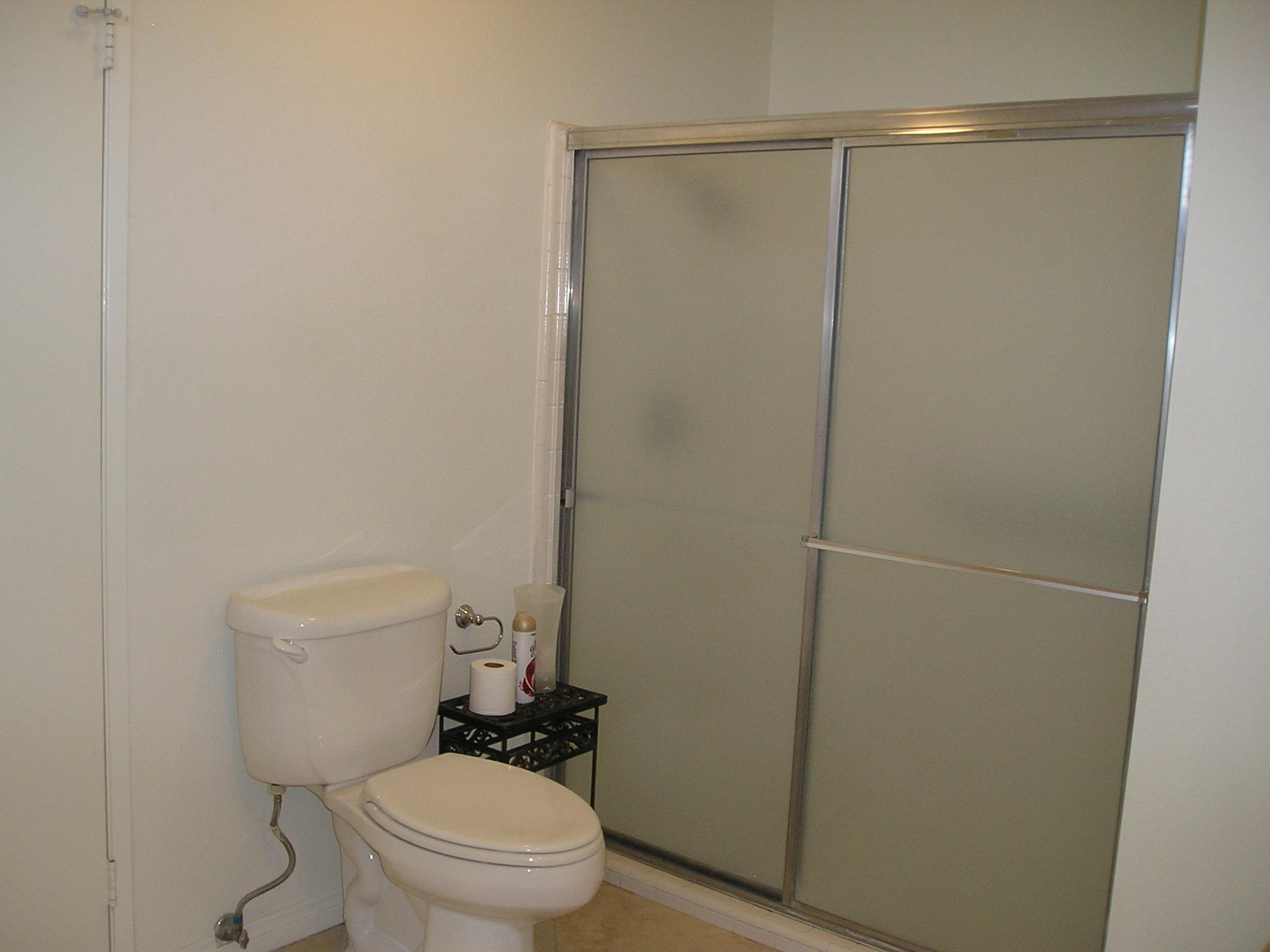 38 Malaga Drive Rancho Mirage, CA 92270 - Photo 26 of 37 a white toilet sitting next to a shower