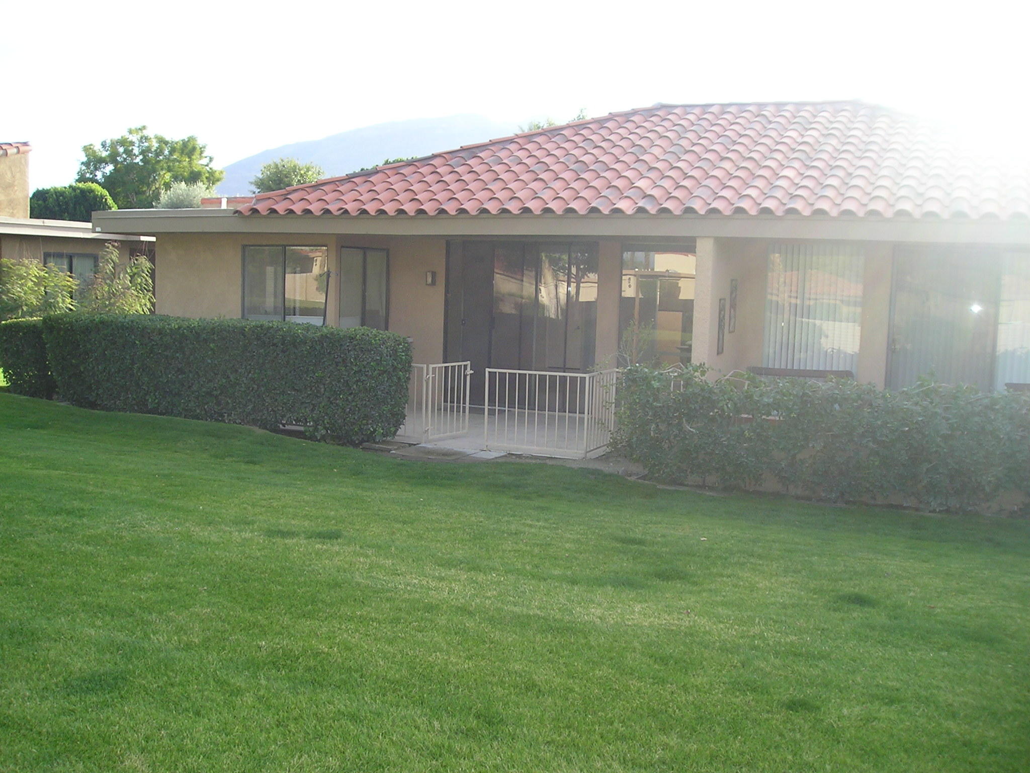 38 Malaga Drive Rancho Mirage, CA 92270 - Photo 37 of 37 a front view of a house with garden