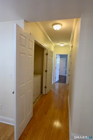 a view of hallway with livingroom