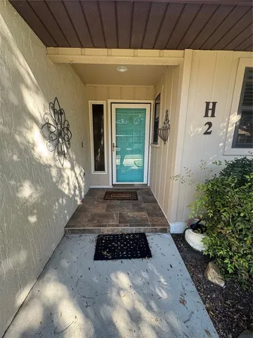 a view of a entryway door of the house