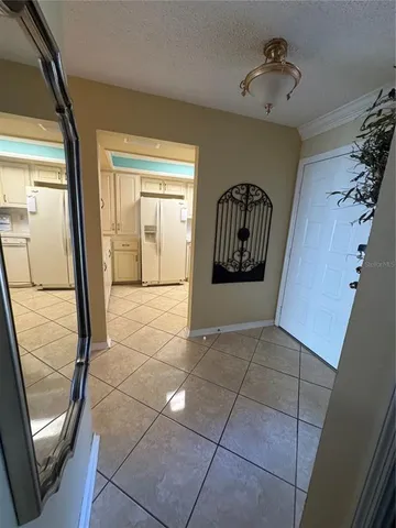 a view of a hallway with windows