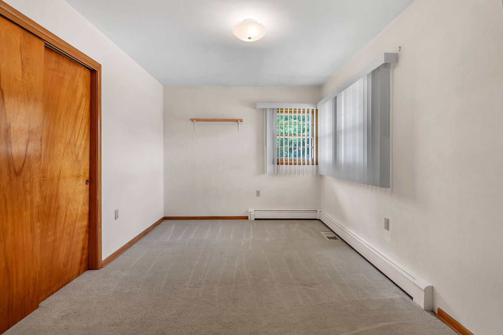 312 Wilmac Street Dwight, IL 60420 - Photo 11 of 26 an empty room with windows