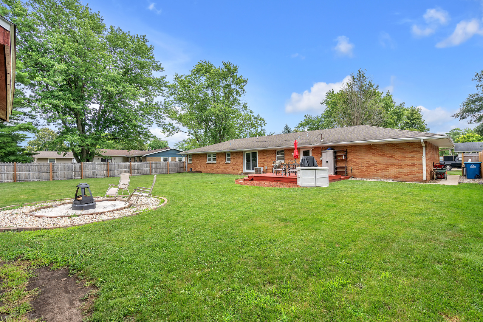 312 Wilmac Street Dwight, IL 60420 - Photo 20 of 26 a front view of a house with a garden