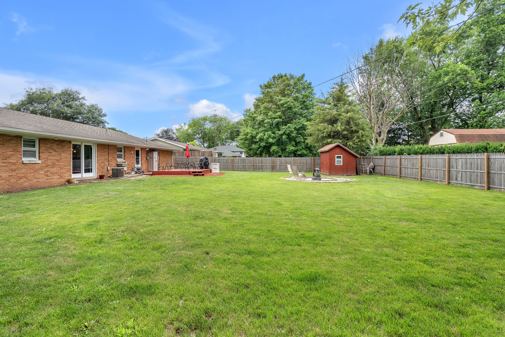 312 Wilmac Street Dwight, IL 60420 - Photo 25 of 26 a view of a house with a yard and sitting area