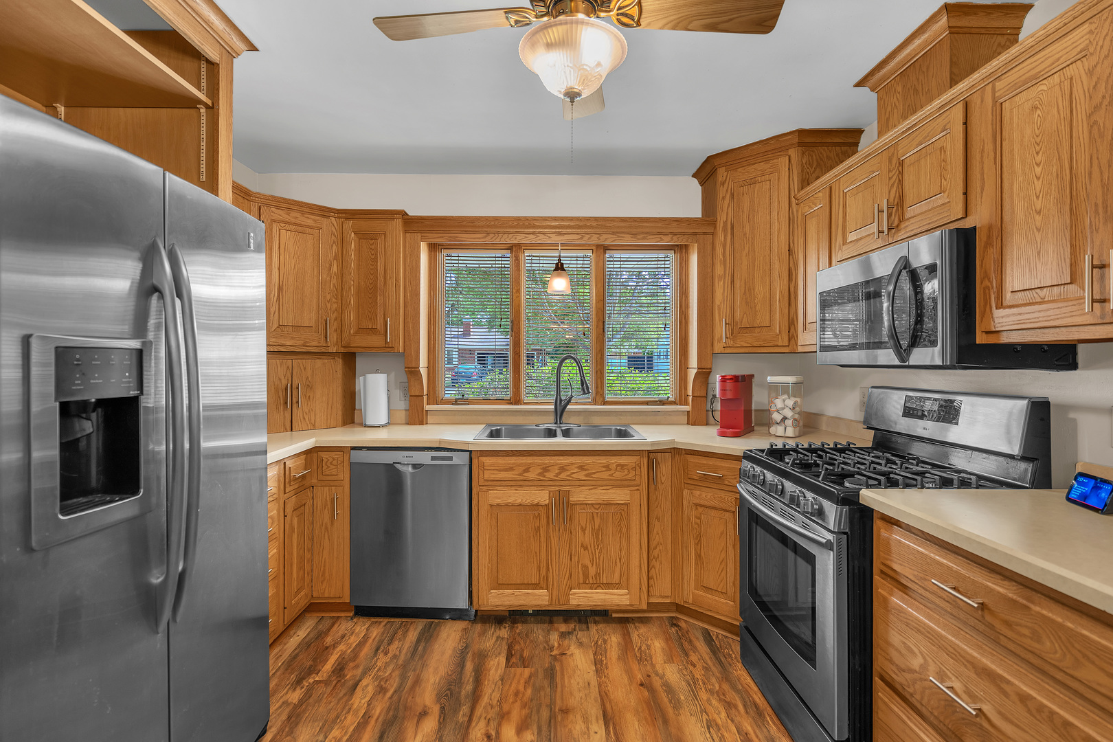 312 Wilmac Street Dwight, IL 60420 - Photo 4 of 26 a kitchen with stainless steel appliances a sink stove and cabinets