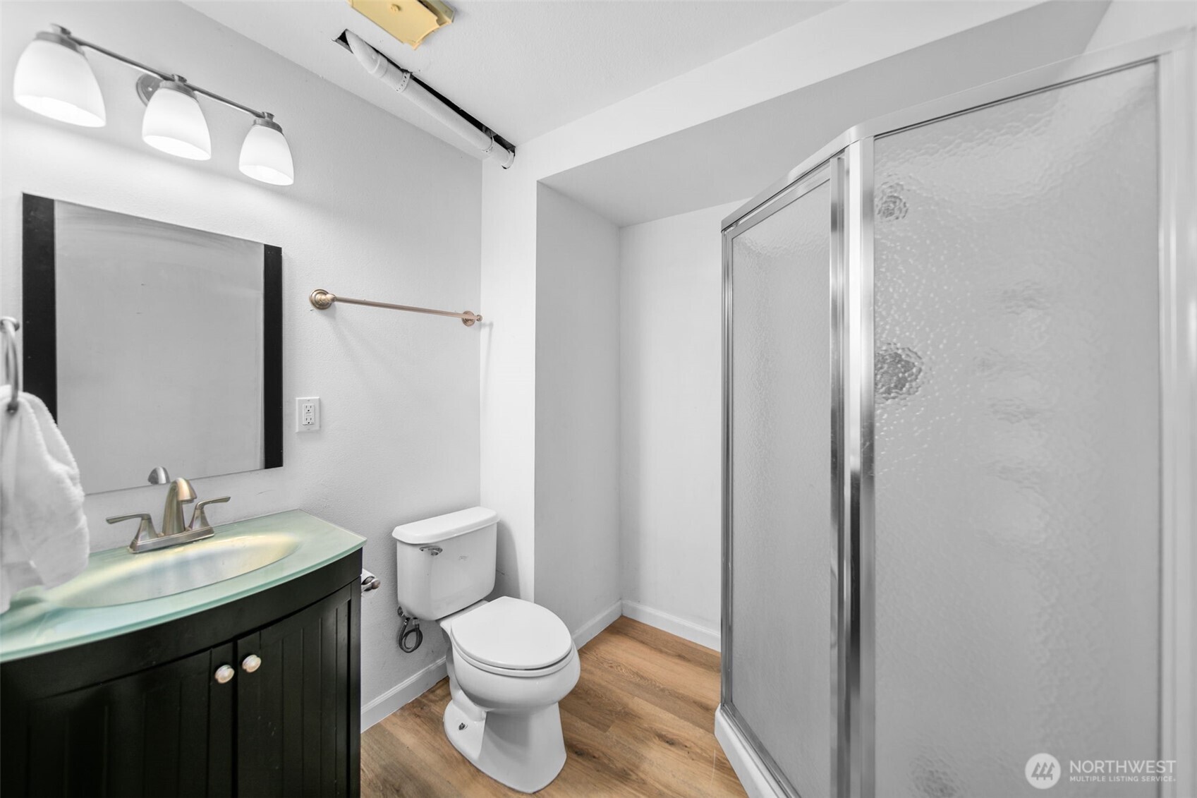 4195 Squilchuck Road Wenatchee, WA 98801 - Photo 18 of 39 a bathroom with a double vanity sink toilet and shower