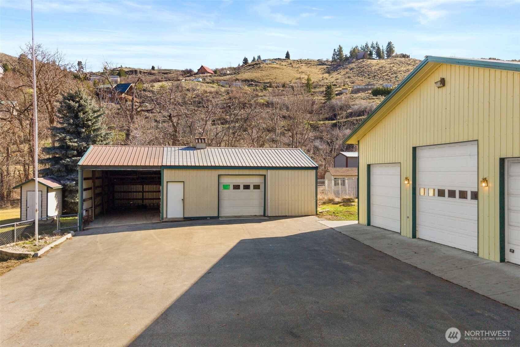 4195 Squilchuck Road Wenatchee, WA 98801 - Photo 22 of 39 a front view of a house with a yard
