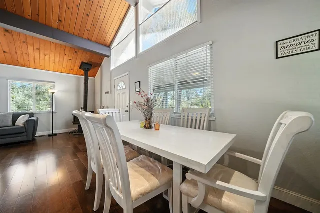 a kitchen with stainless steel appliances granite countertop a stove and a refrigerator