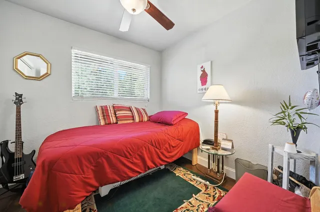a view of a livingroom with furniture and a flat screen tv