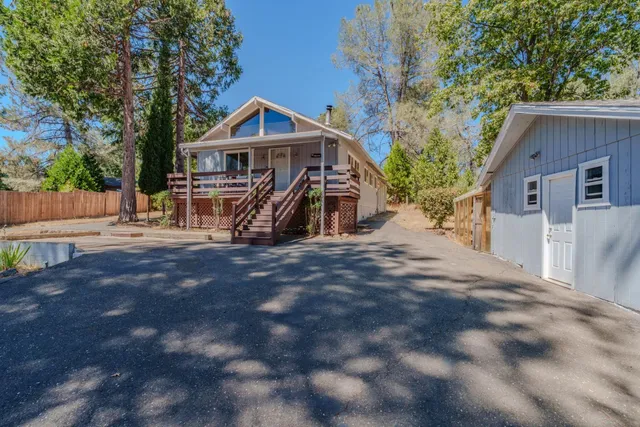 a front view of house with yard outdoor seating and yard