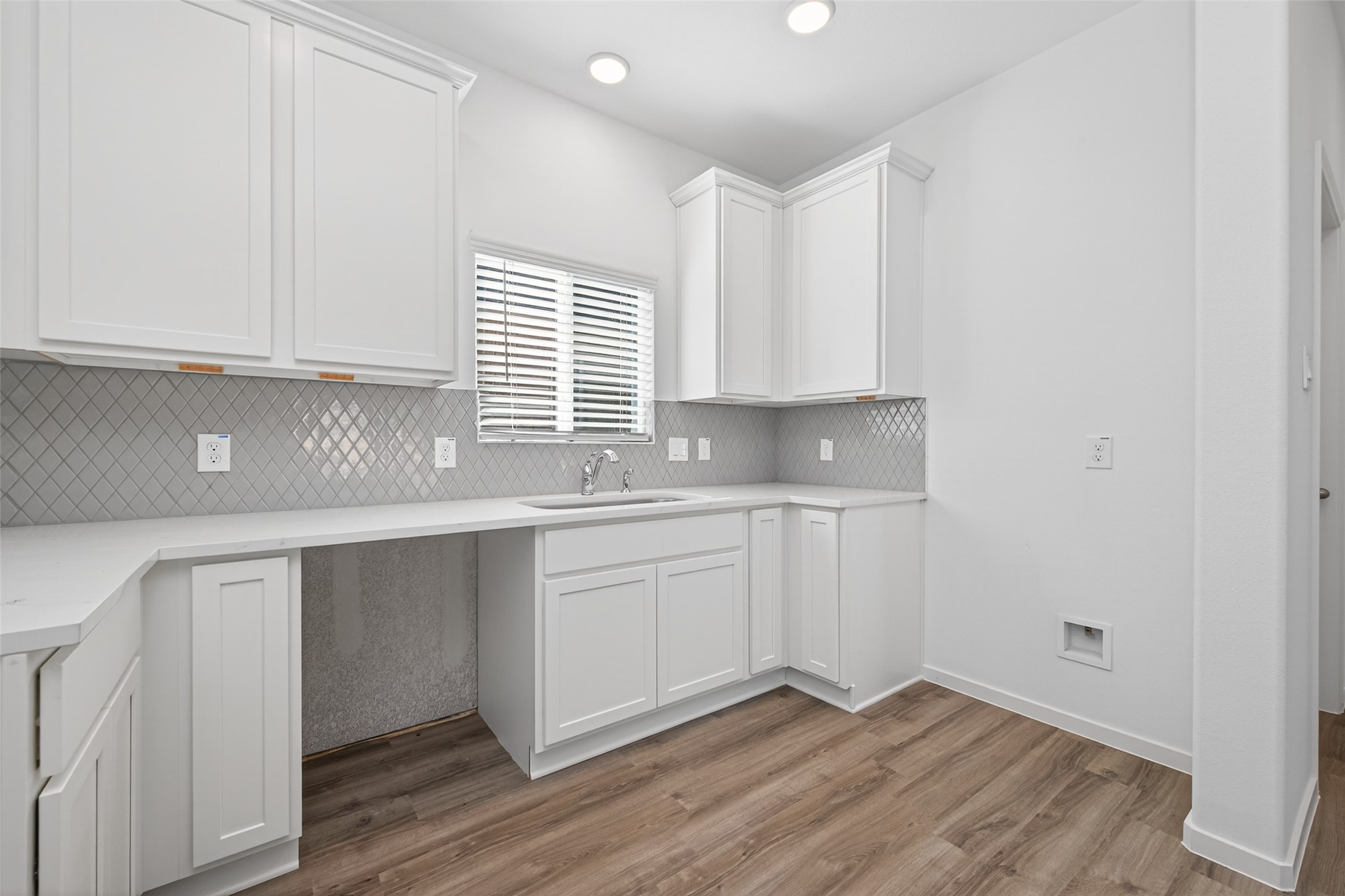 12359 Sunset Canyon Way Willis, TX 77318 - Photo 14 of 35 a kitchen with granite countertop white cabinets and white appliances