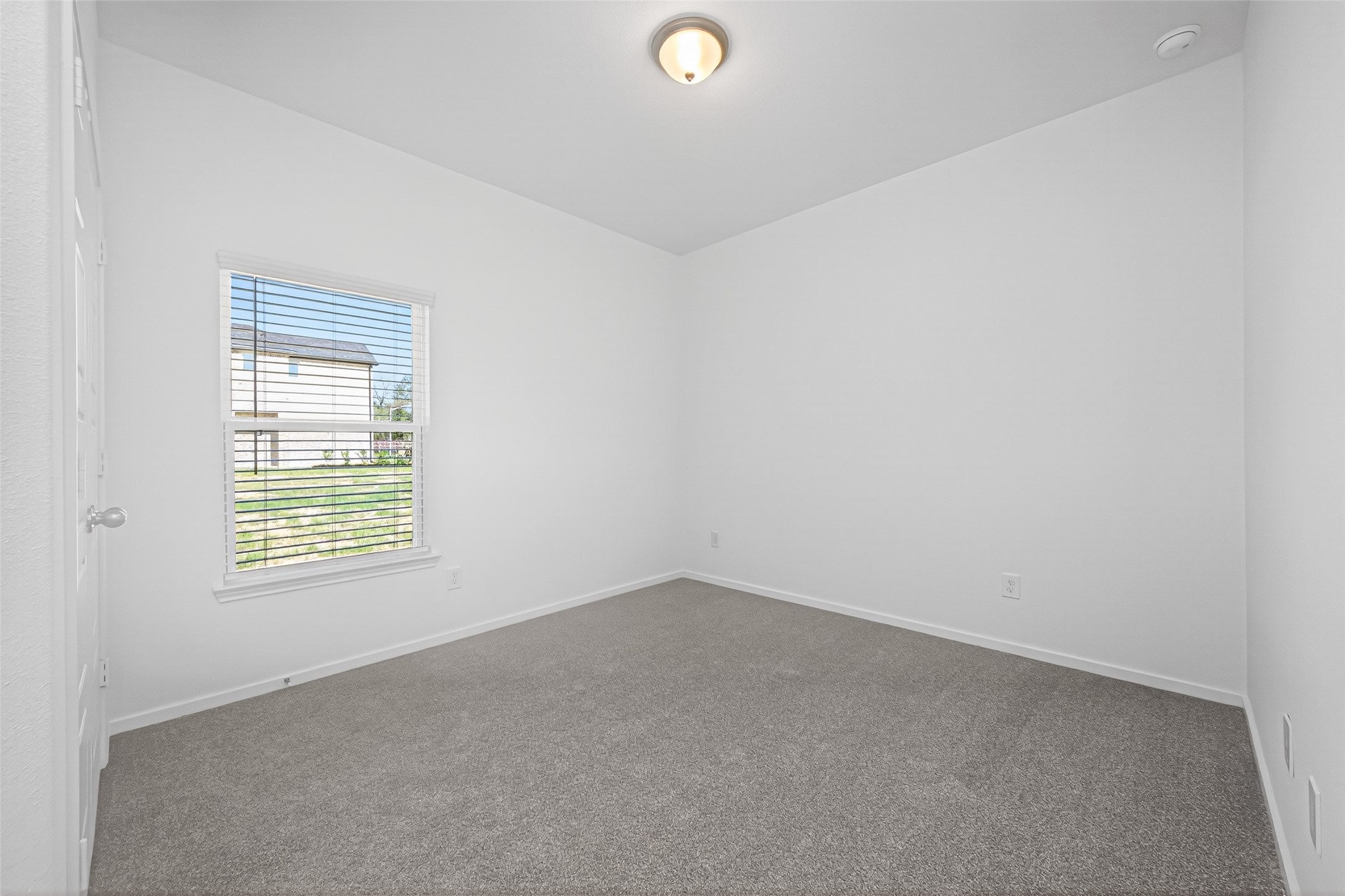 12359 Sunset Canyon Way Willis, TX 77318 - Photo 18 of 35 an empty room with a window