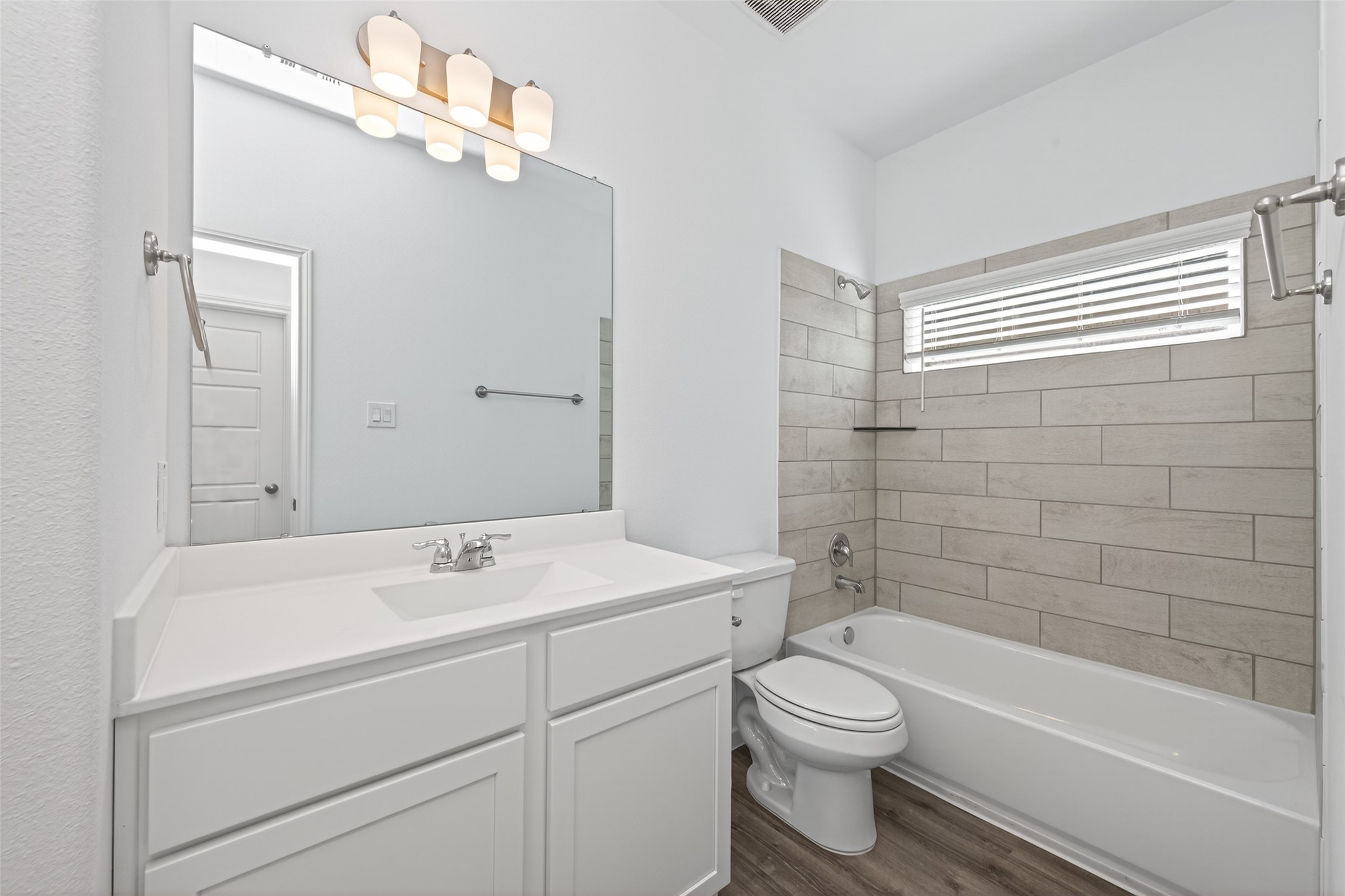 12359 Sunset Canyon Way Willis, TX 77318 - Photo 19 of 35 a bathroom with a sink a toilet and shower