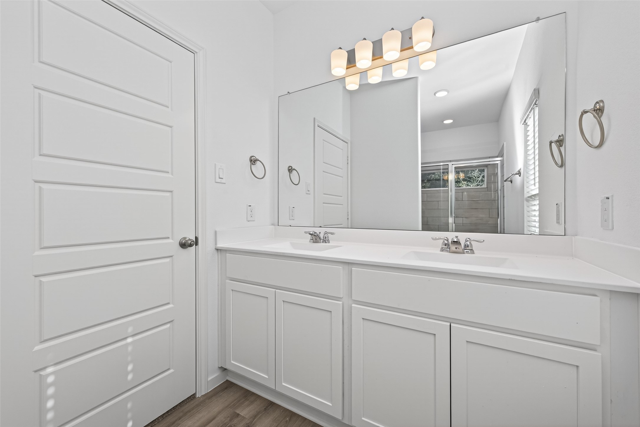 12359 Sunset Canyon Way Willis, TX 77318 - Photo 26 of 35 a bathroom with a double vanity sink and mirror