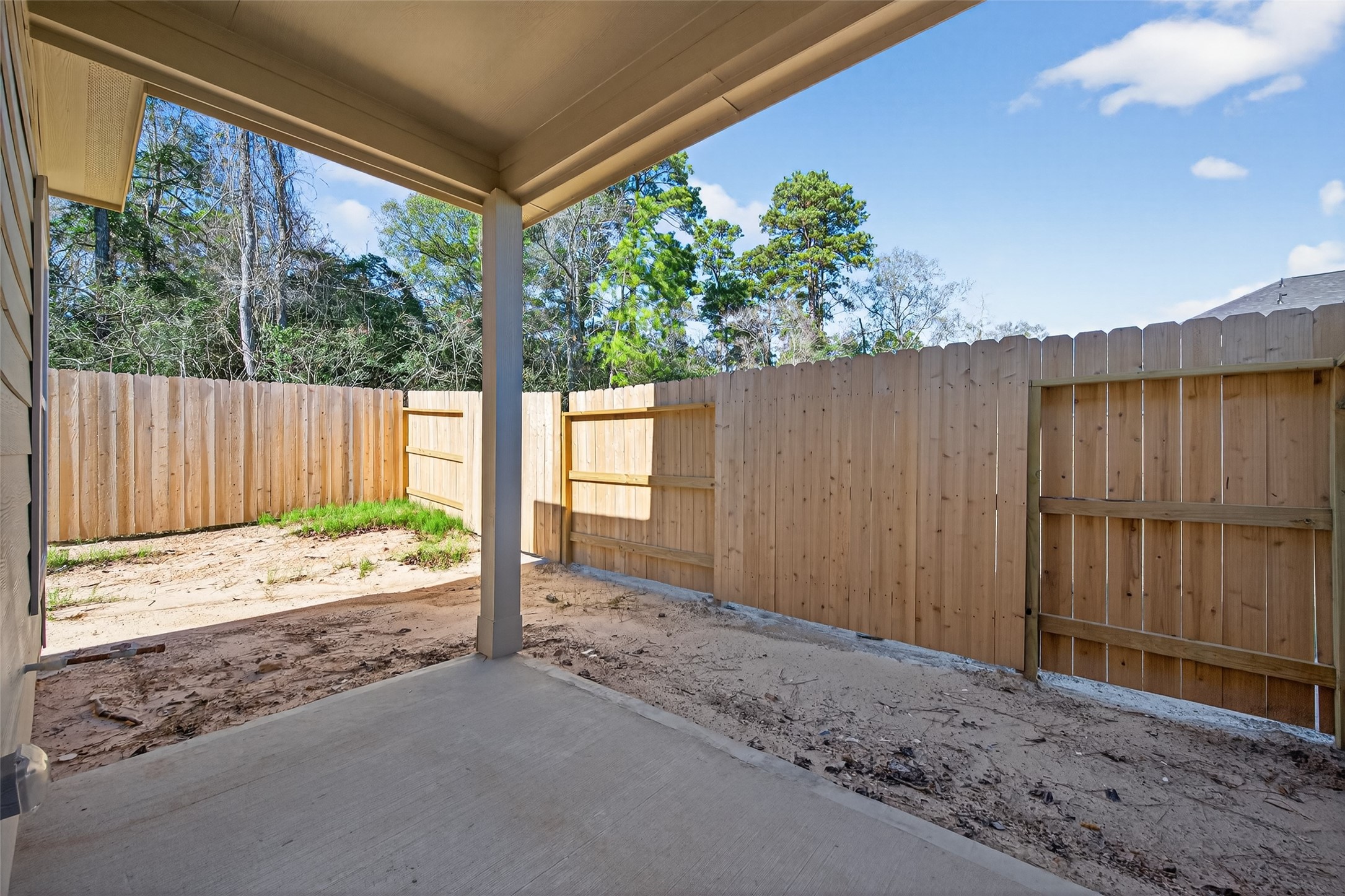 12359 Sunset Canyon Way Willis, TX 77318 - Photo 30 of 35 a backyard of a house