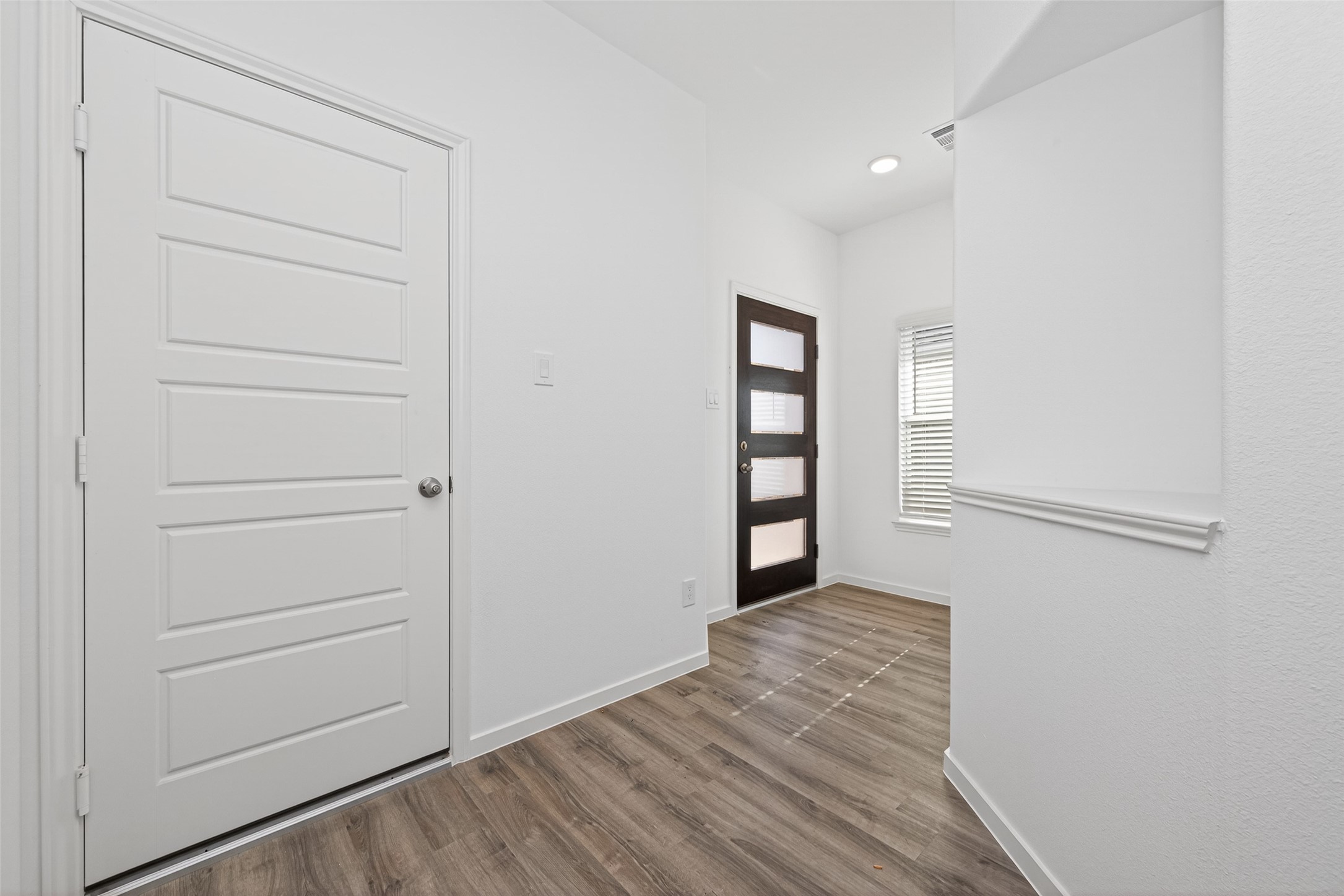 12359 Sunset Canyon Way Willis, TX 77318 - Photo 6 of 35 wooden floor in an empty room with a window