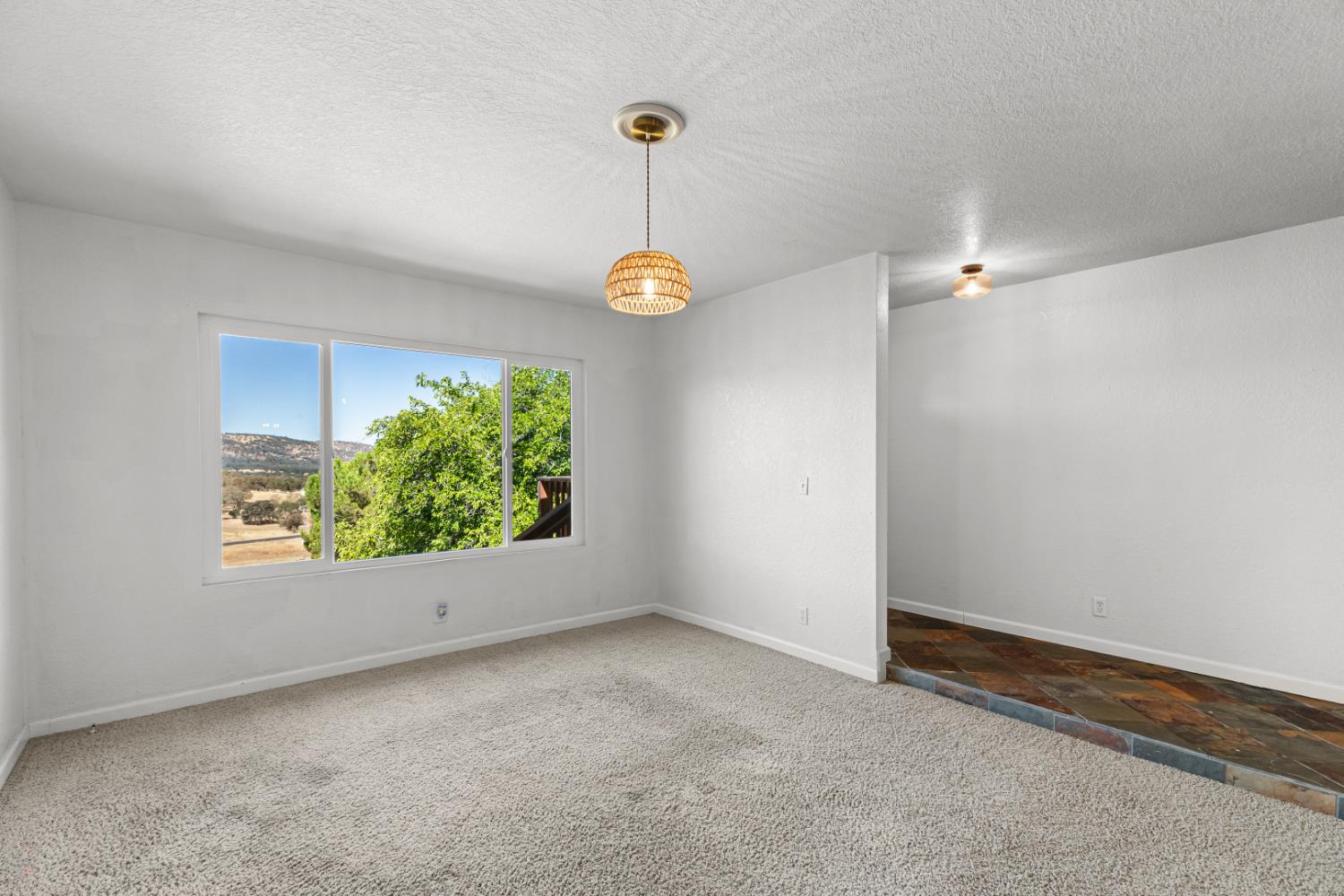 2512 Quail Hill Road Copperopolis, CA 95228 - Photo 19 of 70 a view of a room with window and stairs