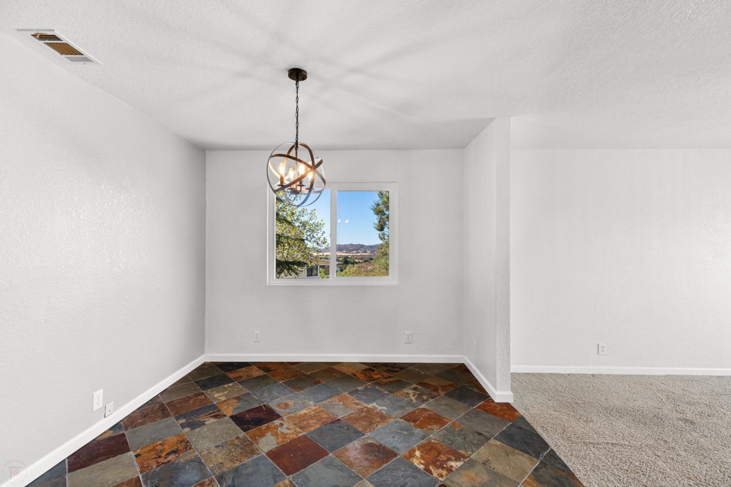 2512 Quail Hill Road Copperopolis, CA 95228 - Photo 23 of 70 a very nice looking room with a rug